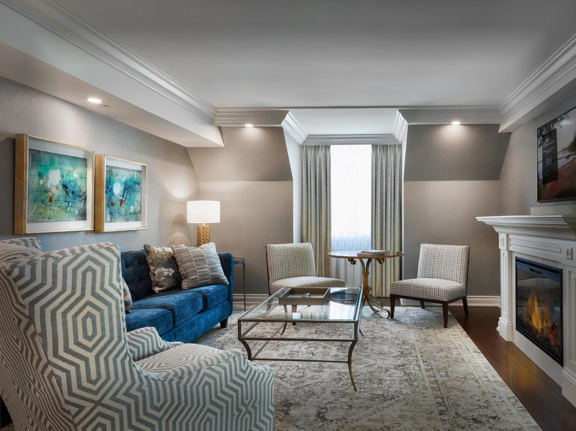 Chateau Vaudreuil Vaudreuil-Dorion Exterior foto A living room at the hotel